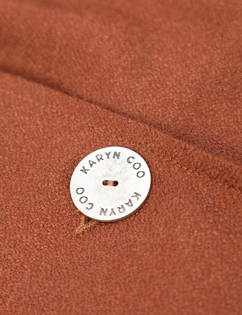 Abrigo sastre Muka óxido